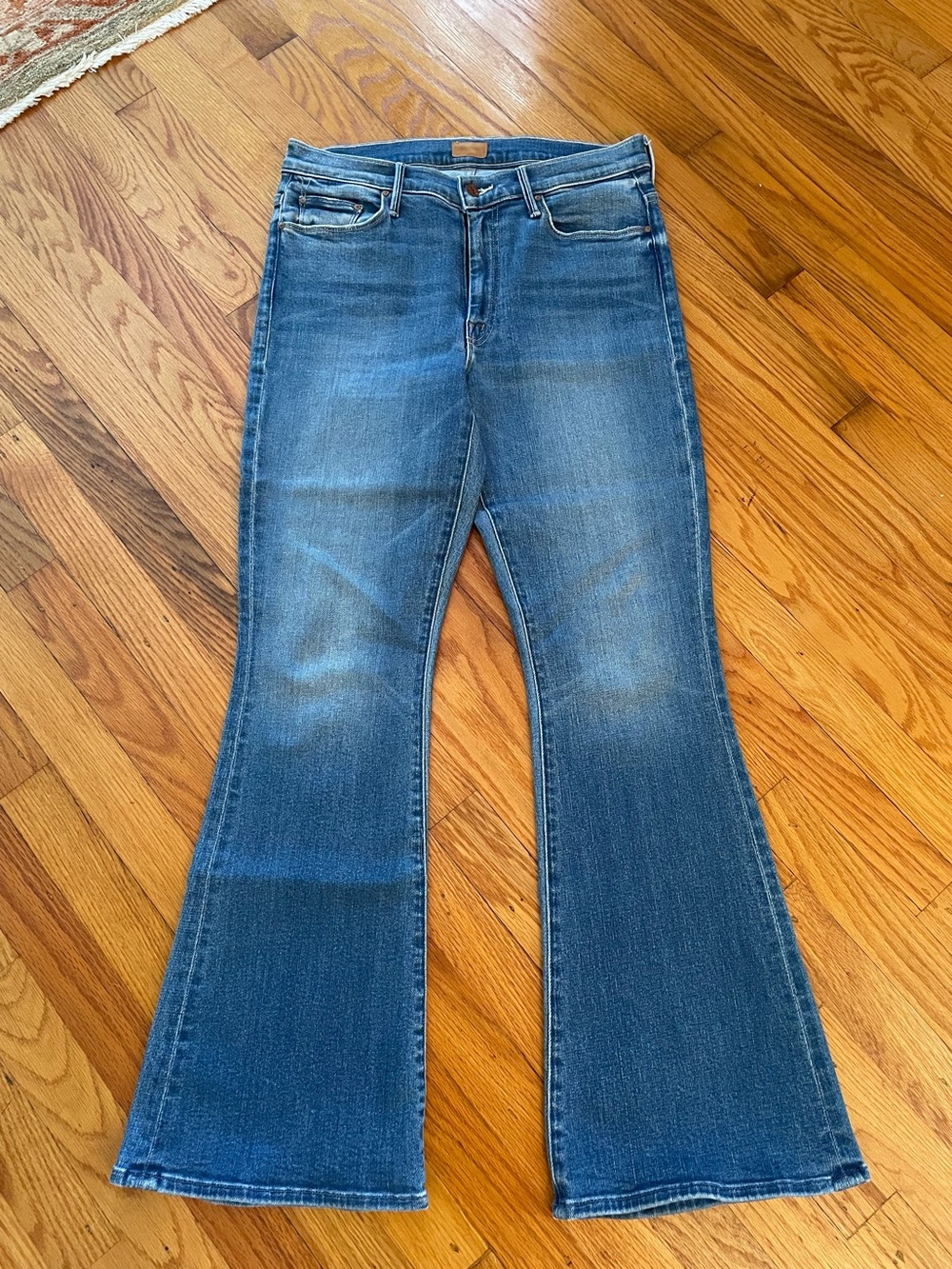 MOTHER Weekender in Layover was. Blue Flare Jeans with Subtle Fade